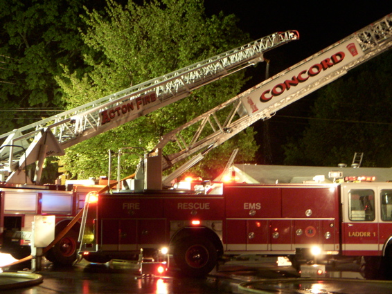 http://www.garrettharding.com/photos/Nikon Results May 2007/5 West Concord Fire - Close Up Ladder Trucks small.jpg